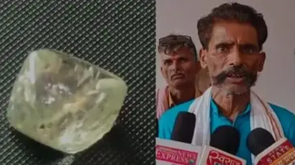 Người đàn ông may mắn tìm thấy viên kim cương 11,88 carat - Ảnh 1.
